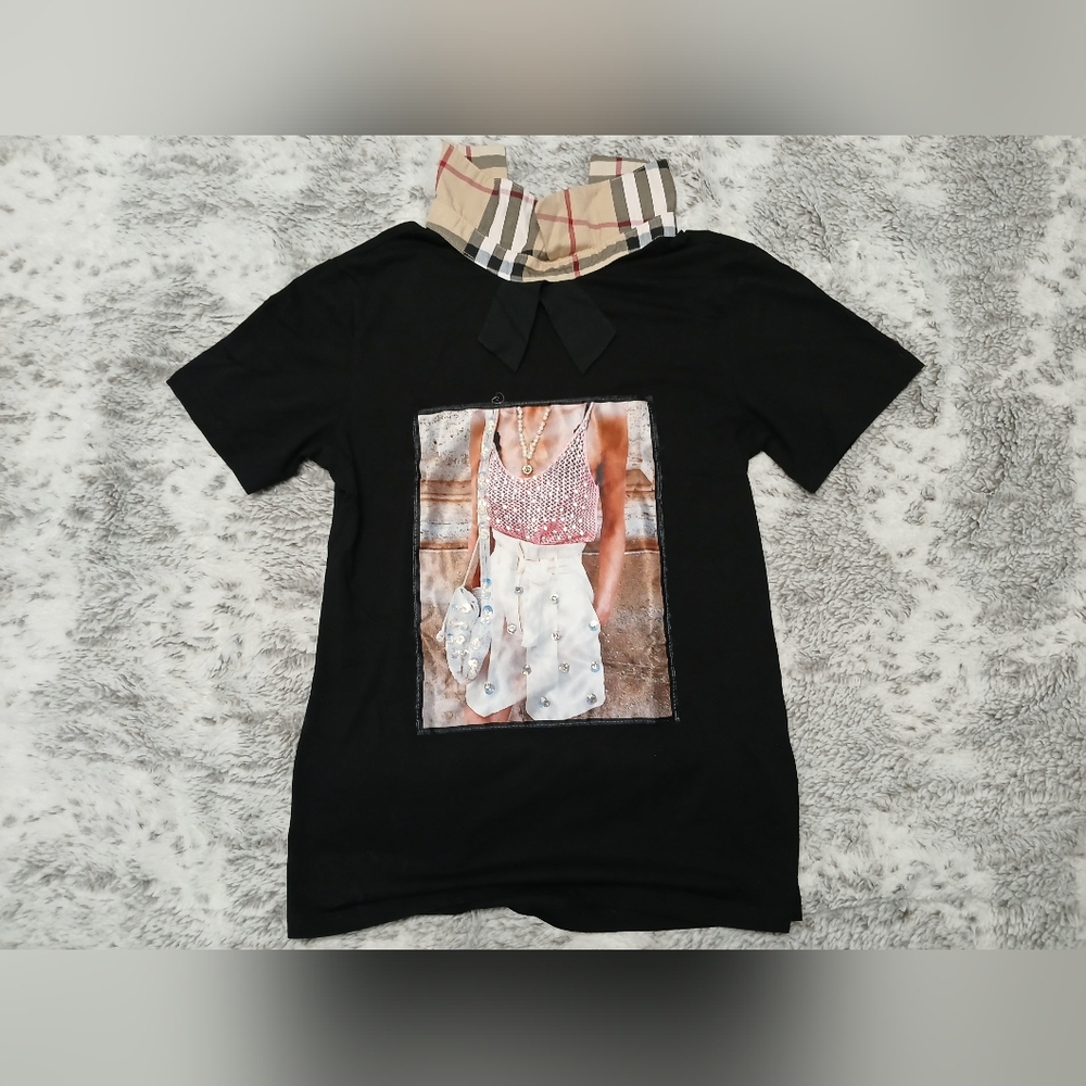 Stylish Black Graphic Tee with Plaid Accent